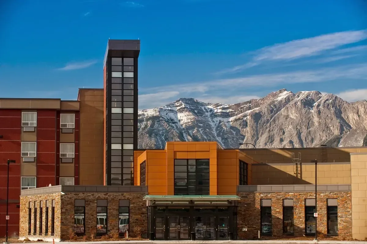 Mountain-edge resort landscape under open sky